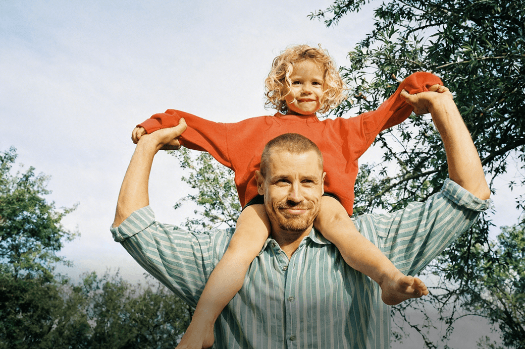 Dad's shoulders make the world feel bigger.