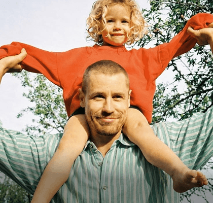 Dad's shoulders make the world feel bigger.